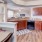 a kitchen with wooden cabinets