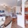 a kitchen with a dining table and chairs