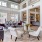 a large room with a dining table and chairs