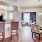 a large kitchen with a dining table