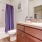 a bathroom with a tub sink and toilet